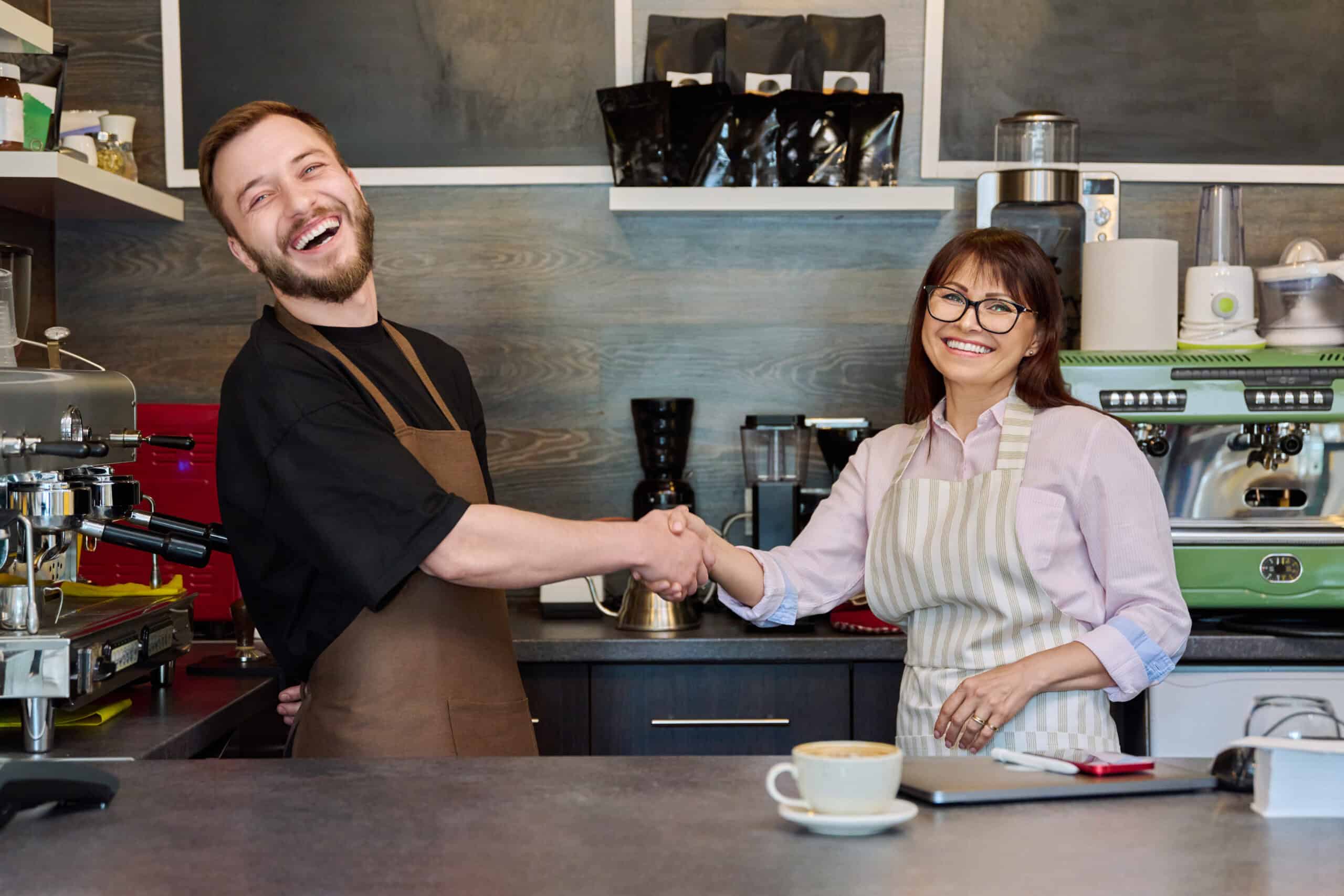 Colleagues Partners Man And Woman Shake Hands I for Fractional Coo